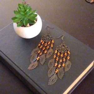 Silver bohemian filigree/feather earrings